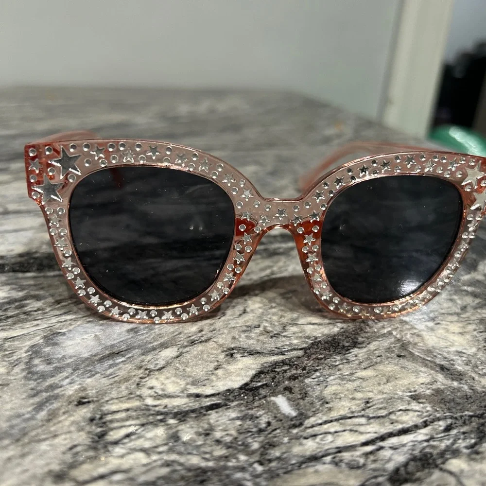 Stylish Pink Sunglasses with Star Accents